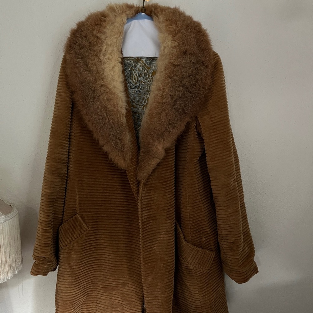 Vintage corduroy coat with a faux fur collar and satin paisley lining.